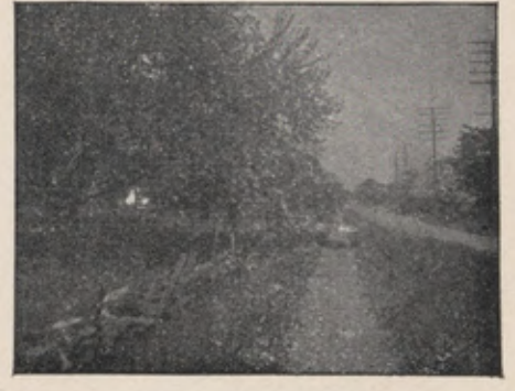 Hazy photograph of the same canal made with a dirty lens.